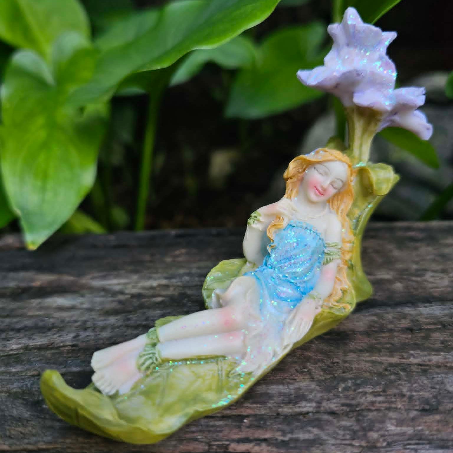 Relaxing Fairy on Flower Bed
